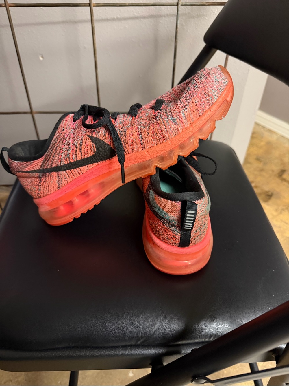 Nike Womens Coral/Pink Flyknit Air Max Sneakers with Black Swoosh